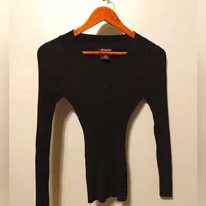 Form fitting sweater with buttons on the side